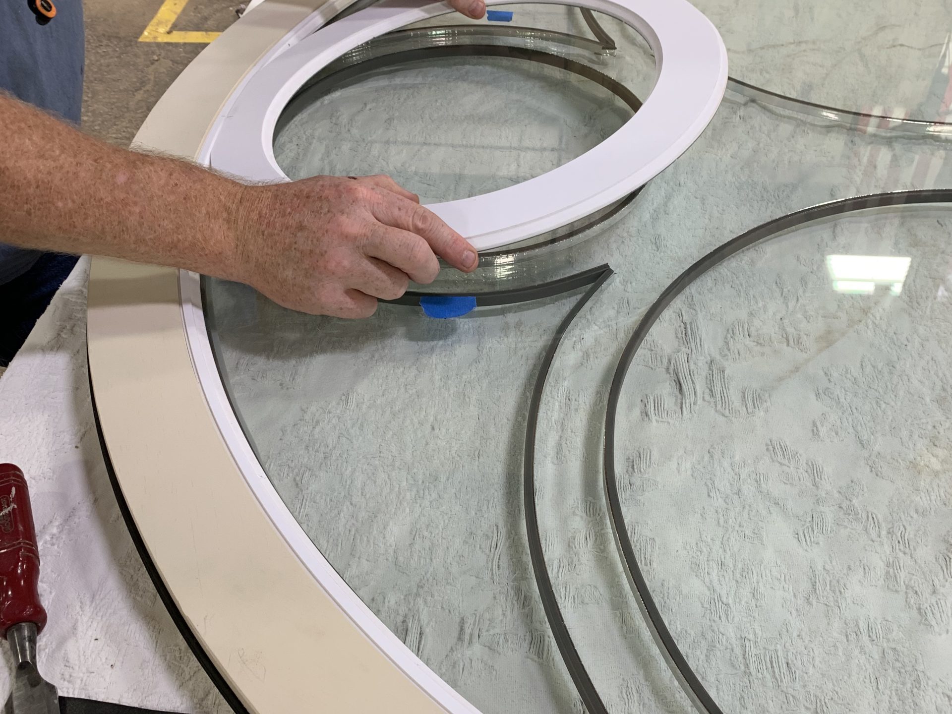 Installing muntin pieces on insulated glass