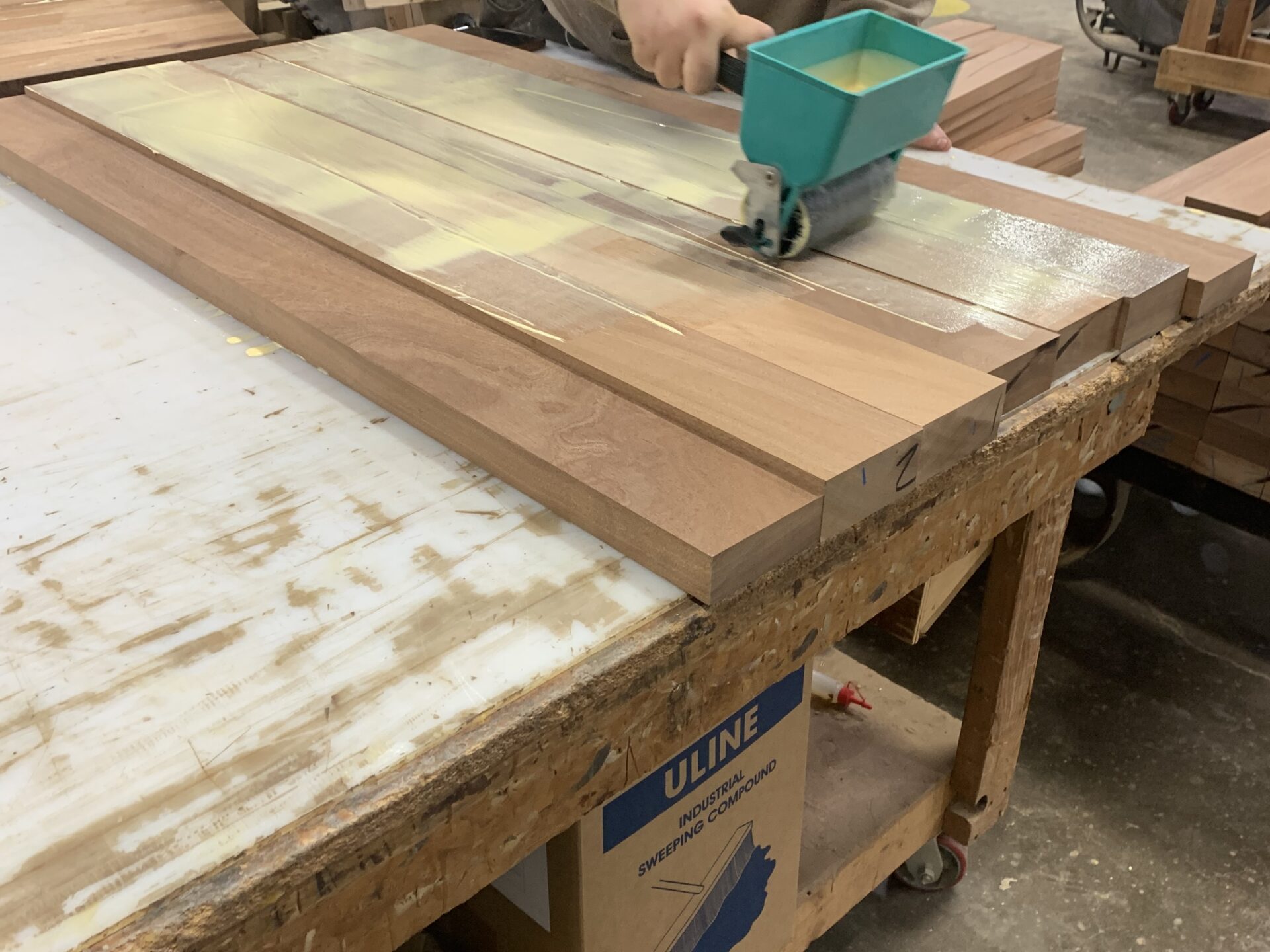 Gluing up mahogany to create stair tread